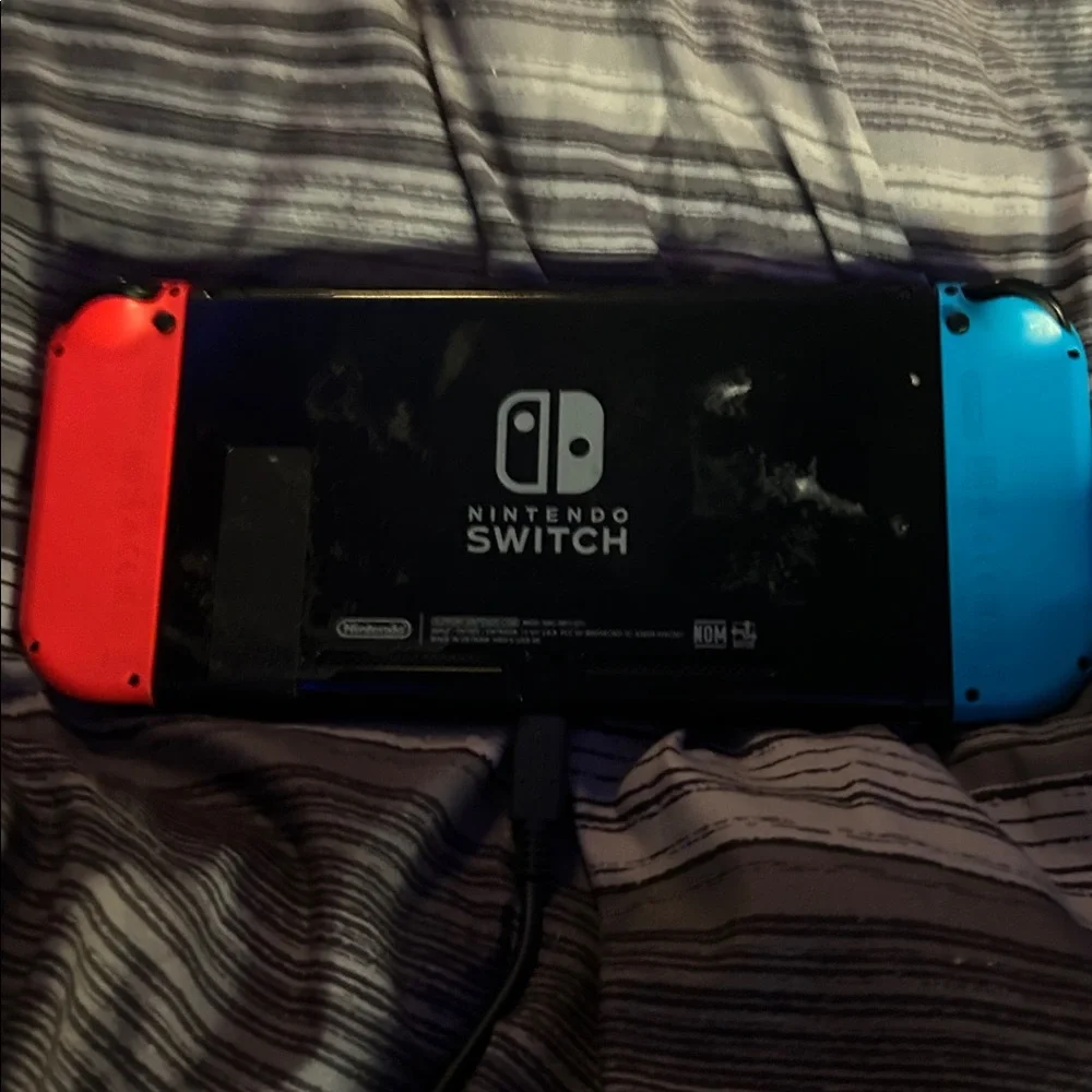 Nintendo Switch with Blue and Red Joy-Con Controllers